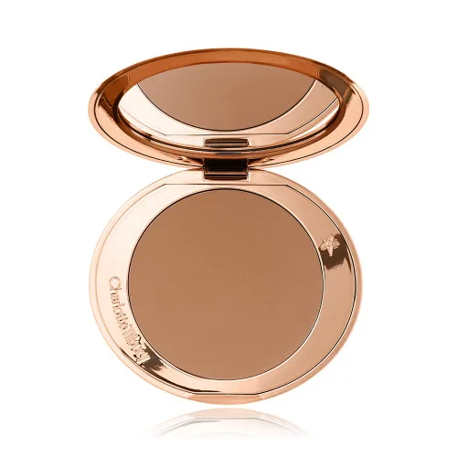 برنزر پودری لوکس شارلوت تیلبری مدل airbrush bronzer بافت نرم و فید آسان رنگ 3TAN/DORE برنزر پودری لوکس شارلوت تیلبری مدل airbrush bronzer بافت نرم و فید آسان رنگ 3TAN/DORE