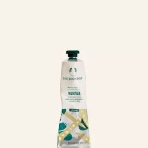 کرم دست مورینگا و شی باتر رنگ زرد کمرنگ بادی شاپ مناسب دست های خشک جدا شده از گیفت ست MORINGA hand balm